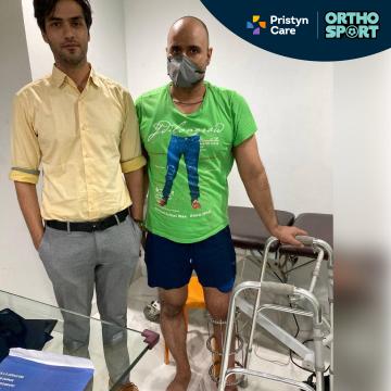 Dr Manu Bora Treating Patients 1
