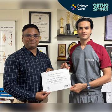 Dr Manu Bora Treating Patients 2