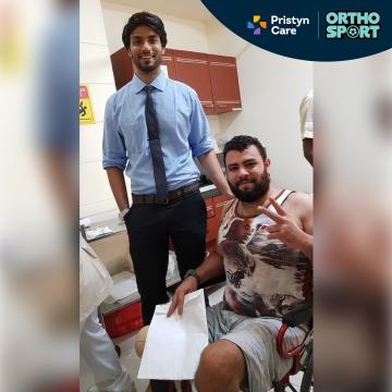 Dr Manu Bora Treating Patients 4