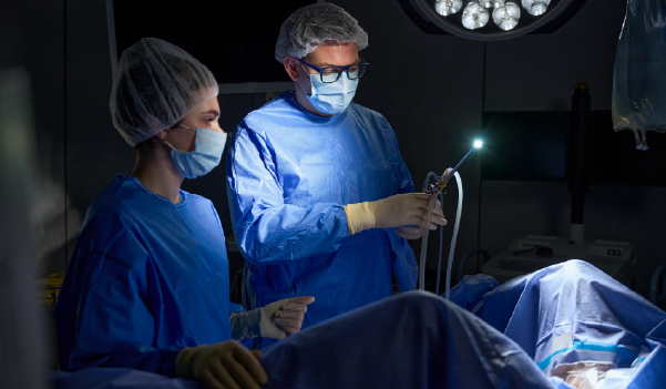 Gynecologist performing laser vaginal tightening