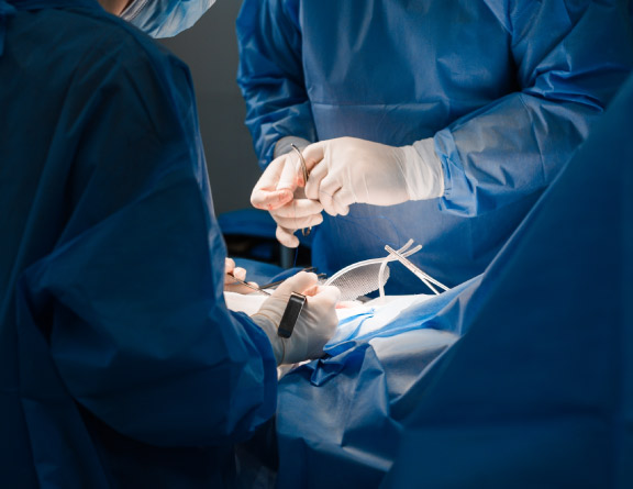 Doctor examining patient's stomach area for hernia diagnosis