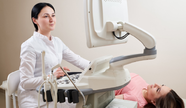 Gynecologist performing labiaplasty surgery