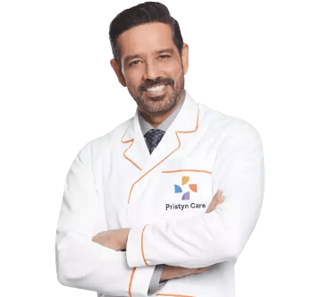 Anup soni wearing Pristyncare's doctor uniform