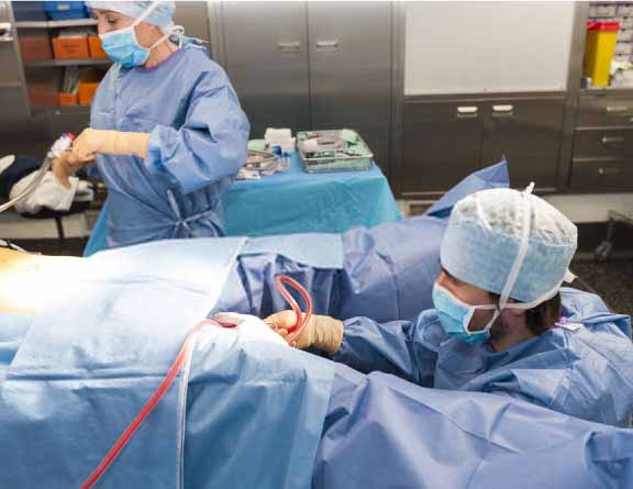 Doctor-performing-Medical termination of pregnancy-surgery-in-Vadodara